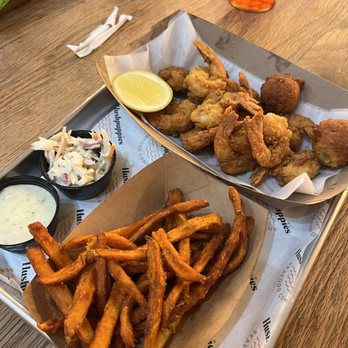 Hushpuppies Seafood Kitchen - Fried shrimp basket with sweet potato fries - Seafood Near Me - Summerville, South Carolina Hushpuppies Seafood Kitchen - Fried shrimp basket with sweet potato fries - Seafood Near Me - Summerville, South Carolina
