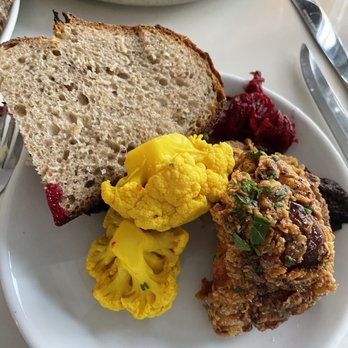 Yalla - fried chicken with pickled cauliflower, and you can't see it but pastrami with house-made rye bread and horseradish sauerkraut. - Mediterranean Near Me - Portland, Oregon