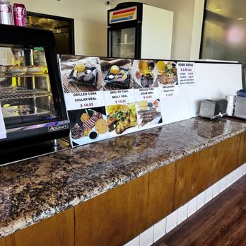 Tony's Barbecue - a counter with a variety of food items - Barbeque Near Me - Diamond Bar, California Tony's Barbecue - a counter with a variety of food items - Barbeque Near Me - Diamond Bar, California