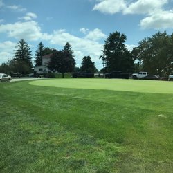 Rea Park Golf Course & Driving Range - Putting green and clubhouse in background.