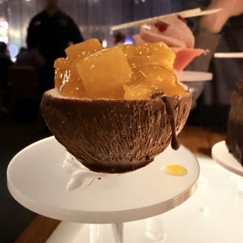 Morimoto - Tiny apricot coconut panna cotta. Chocolate cup molded to mimic a coconut - Japanese Near Me - Las Vegas, Nevada Morimoto - Tiny apricot coconut panna cotta. Chocolate cup molded to mimic a coconut - Japanese Near Me - Las Vegas, Nevada