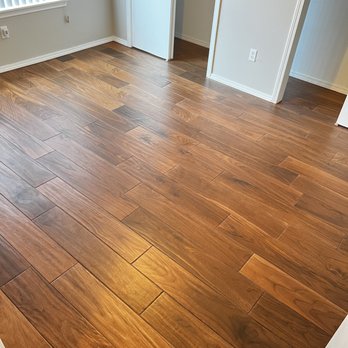 Schreiber Flooring - a hardwood floor in a bedroom - Flooring Near Me Schreiber Flooring - a hardwood floor in a bedroom - Flooring Near Me