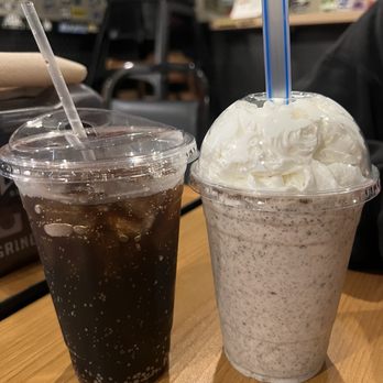 Grinderz - 20oz Fountain Drink (Left) & Regular Oreo Shake (Right) - Burgers Near Me - Huntington Beach, California Grinderz - 20oz Fountain Drink (Left) & Regular Oreo Shake (Right) - Burgers Near Me - Huntington Beach, California