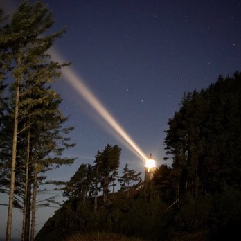 Heceta Lighthouse Bed & Breakfast - Night view of the lighthouse from the B&B - Bed & Breakfast Near Me - Yachats, Oregon