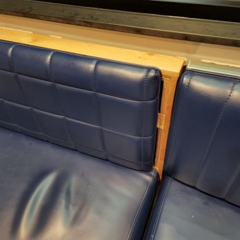 Rob's Upholstery - Raising Canes booth before - Furniture Reupholstery Near Me