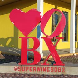 Super Wings - OBX sign out front