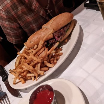 Hugo's Frog Bar and Chop House - Prime rib sandwich comes with fries - Steakhouses Near Me - Des Plaines, Illinois