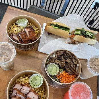 Saiga Vietnamese Eatery - Came to eat with a friend. I got the Banh Mi sandwich and garlic noodles with chicken and coconut coffee for my drink. - Vietnamese Near Me - Orange, California