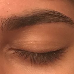 Right eye: it's thin and uneven, but thicker than the left eyebrow.