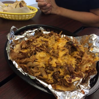 Yummies Donuts & BBQ - Pulled pork nachos! - Bakeries Near Me - Venice, Florida Yummies Donuts & BBQ - Pulled pork nachos! - Bakeries Near Me - Venice, Florida