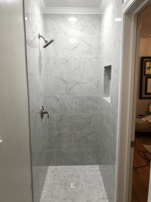 Cloud Nine Construction - Simple and clean marble look porcelain with 1/32" tight grout joint - Fresno, CA
