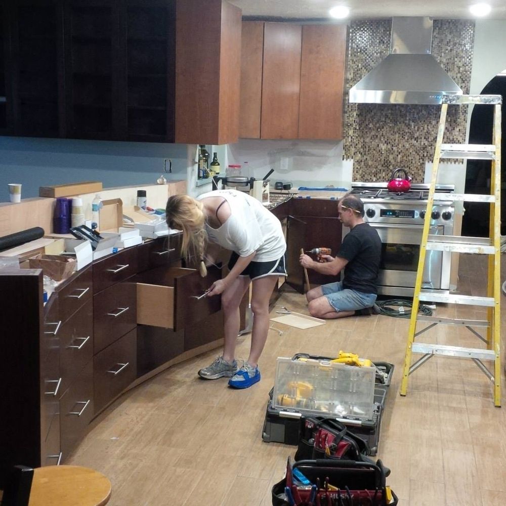Accent Woodworking - Rick and his daughter installing the cabinet hardware. - Furniture Stores Near Me - Largo, Florida Accent Woodworking - Rick and his daughter installing the cabinet hardware. - Furniture Stores Near Me - Largo, Florida