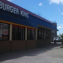the front of a burger king restaurant the front of a burger king restaurant