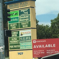 Located in Holiday Plaza Shopping Center.