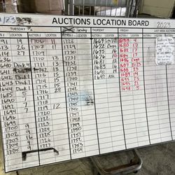 BidFTA - When you come in find this board. Reference your auction number to find which location your packages should be.