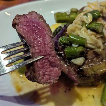 STK Steakhouse - Medium rare NY Strip with King Crab Oscar topping - Steakhouses Near Me - Orlando, Florida STK Steakhouse - Medium rare NY Strip with King Crab Oscar topping - Steakhouses Near Me - Orlando, Florida