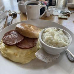 The Village Grille and Pump - Bagel and Egg Sandwich with extra cheese and Canadian Bacon!