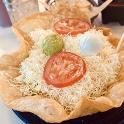 Espiau's - Grande Tostada with beans, ground beef, lettuce, tomato, sour cream, guacamole and lots of cheese