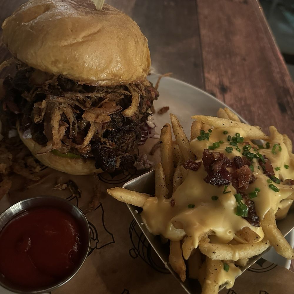 Batch Local Kitchen - Carolina Smoked Brisket Sandwich with loaded fries - Cocktail Bars Near Me - West Palm Beach, Florida Batch Local Kitchen - Carolina Smoked Brisket Sandwich with loaded fries - Cocktail Bars Near Me - West Palm Beach, Florida
