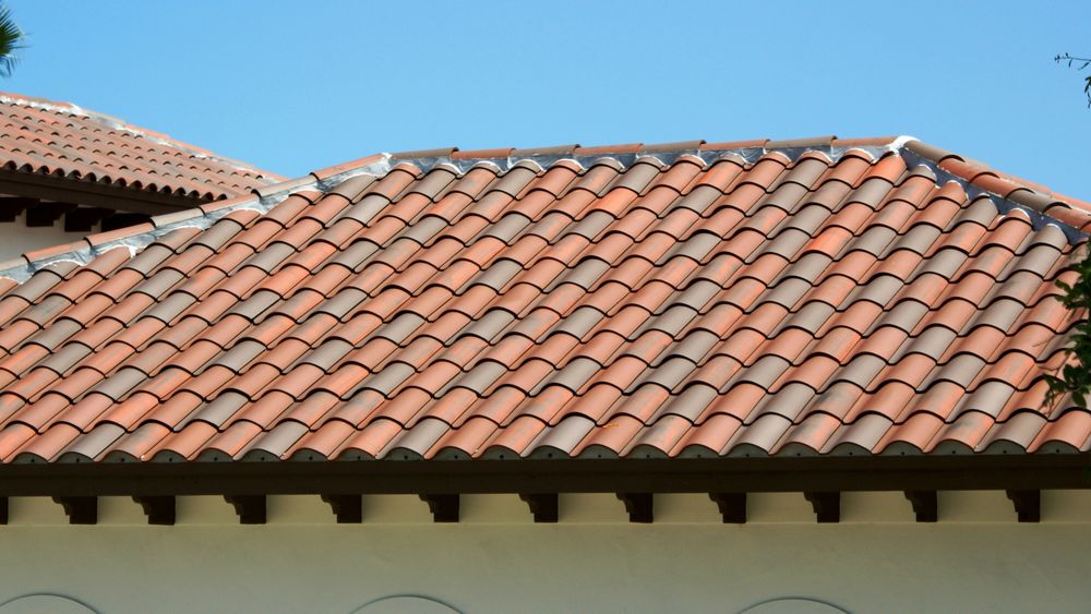 Slide of Greenman Roofing