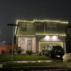 Custom Christmas light installation in Salem, Oregon. Clean roofline lighting with crisp, straight lines that really stand out at night.