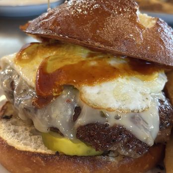 Finley's Round Rock - BYOB - Pretzel bun, mustard, pickles, bbq sauce, pepper jack, fried egg - Delicious !!! - Bars Near Me - Round Rock, Texas