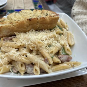 Indigo Moon - Penne Pasta with Sausage, Carmelized Onions, Spinach in Cream Sauce - New American Near Me - Cambria, California Indigo Moon - Penne Pasta with Sausage, Carmelized Onions, Spinach in Cream Sauce - New American Near Me - Cambria, California