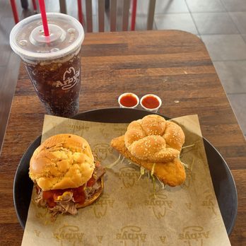 Arbys - Extra large Arby's cup filled with Diet Coke, half pound beef and cheddar, a crispy fish sandwich. And 2 cups Arby's sause. - Fast Food Near Me - Reseda, California