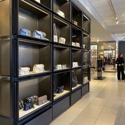 Coach - Inside purse wall that doesn't have any discount (newer items)