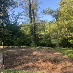 Smith's Landscape Design - Pre ivy removal and sod installation.
