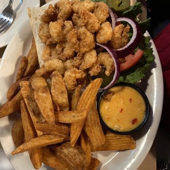 Big Mike's Steakhouse - Shrimp PoBoy with PLENTY of shrimp. The orange sauce packs a little punch - Steakhouses Near Me - Orange Beach, Alabama