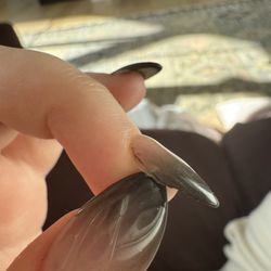 Tulip Nail Spa - The real nail poking out causing pain (after being filed down at home).