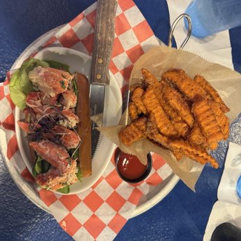 The Nauti Lobstah - Lister roll with double meat ($59) and sweet potatoes fries. - Seafood Near Me - Orlando, Florida The Nauti Lobstah - Lister roll with double meat ($59) and sweet potatoes fries. - Seafood Near Me - Orlando, Florida