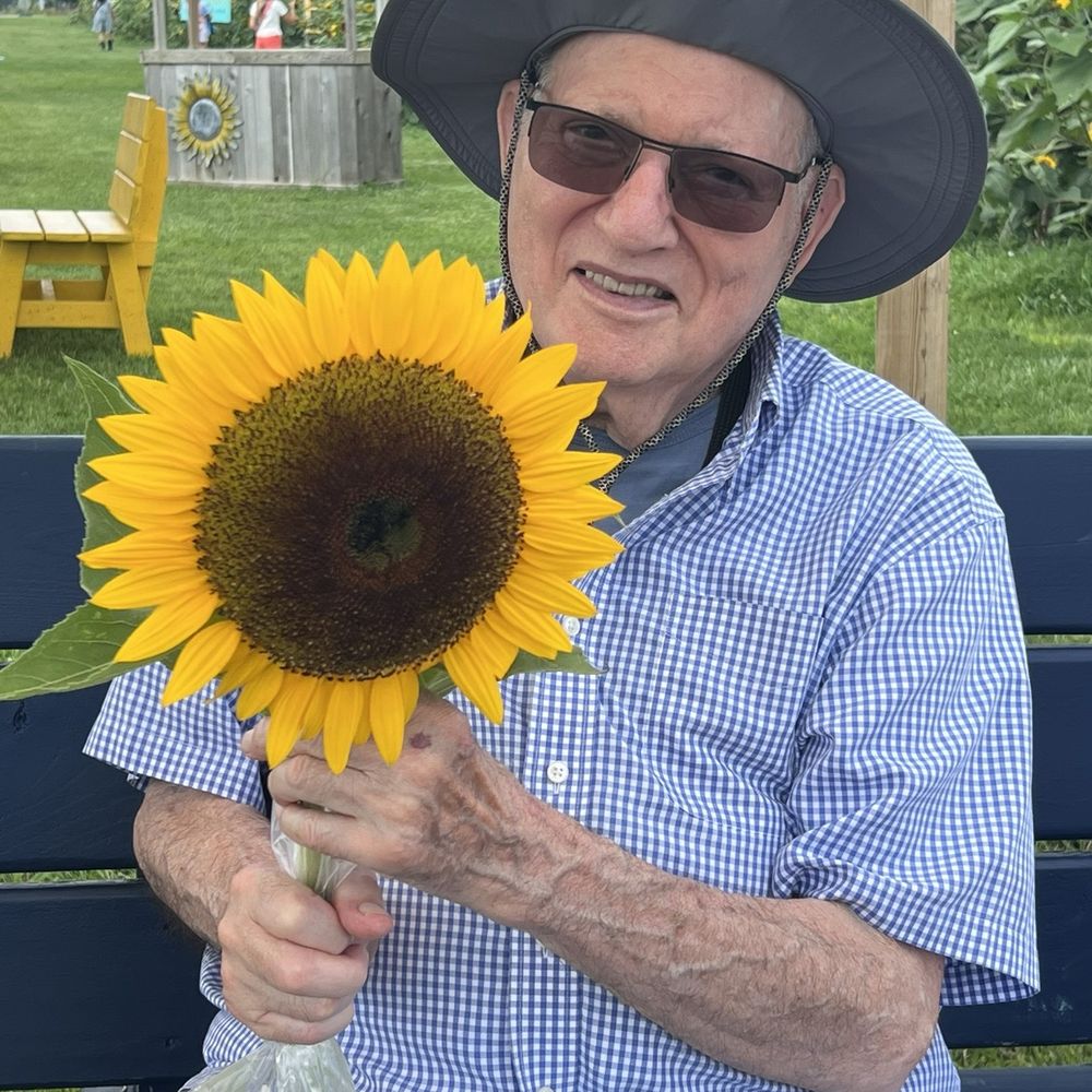 Chestnut Square at The Glen - Yours truly with sunflower on outing with friends - Retirement Homes Near Me - Glenview, Illinois