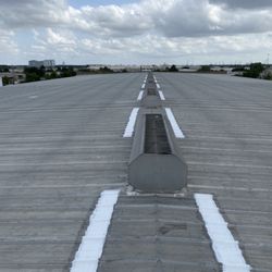 SNT Roofing And Construction - 400 ft of open laps primed and 3 coursed