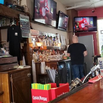 Flappers - two men standing at a bar - Cocktail Bars Near Me - Milwaukee, Wisconsin