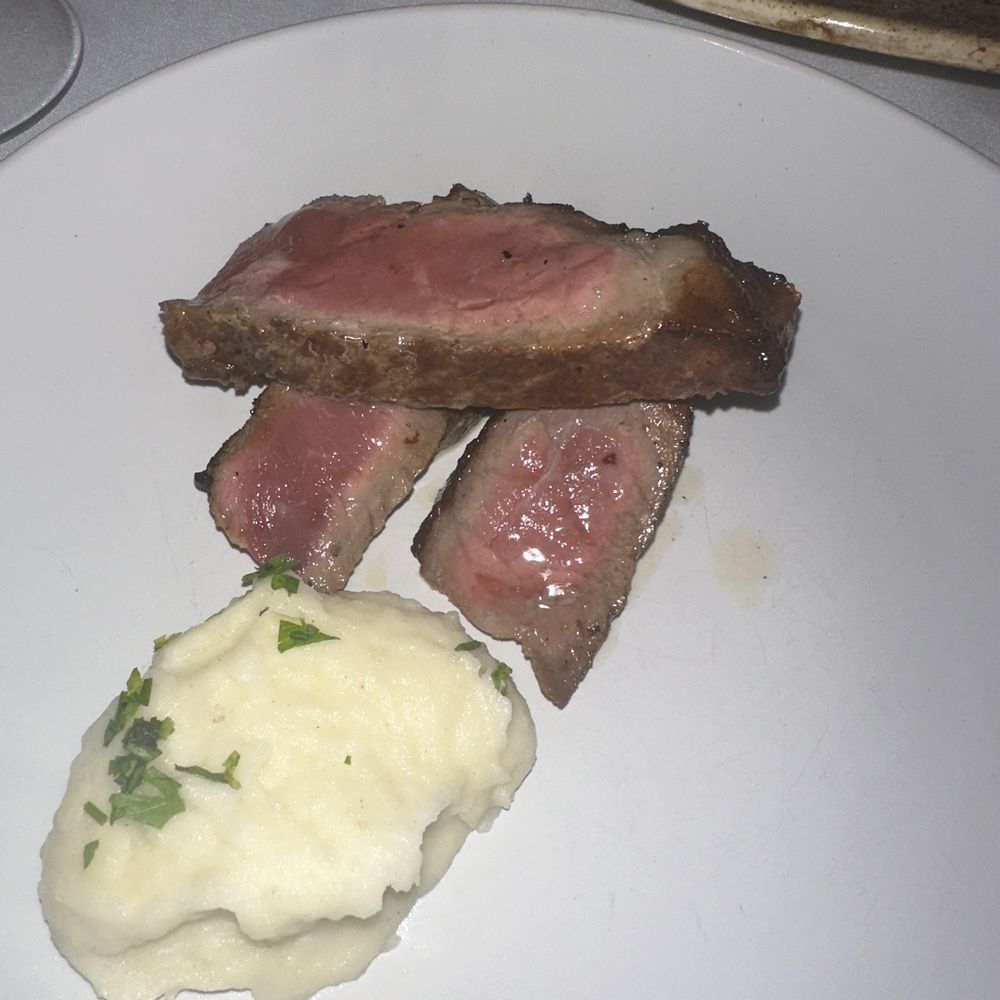 Fiorentina Steakhouse - Porterhouse cooked to perfection with some mashed potatoes - Steakhouses Near Me - The Bronx, New York Fiorentina Steakhouse - Porterhouse cooked to perfection with some mashed potatoes - Steakhouses Near Me - The Bronx, New York