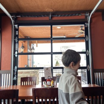 Alpine Tavern & Eatery - Seating in back patio enclosed - American Near Me - Gaylord, Michigan