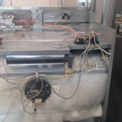 Applicare - The back of a single Verona wall oven with the covers removed while it's being serviced in Paramus New Jersey. July 7th 2025