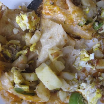 Toasted Bun - Insides of Breakfast Burrito... Meat is MIA - Breakfast & Brunch Near Me - Glendale, California Toasted Bun - Insides of Breakfast Burrito... Meat is MIA - Breakfast & Brunch Near Me - Glendale, California