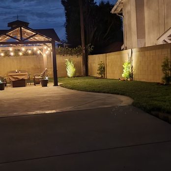 Greener Gardens - a patio with a gazebo and string lights - Landscaping Near Me - Huntington Beach, California Greener Gardens - a patio with a gazebo and string lights - Landscaping Near Me - Huntington Beach, California