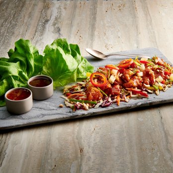 Rainforest Cafe - a plate of lettuce and sauces - American Near Me - Katy, Texas Rainforest Cafe - a plate of lettuce and sauces - American Near Me - Katy, Texas