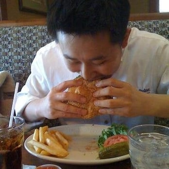 Jameson's Charhouse - Kevin is obliterating that burger - Steakhouses Near Me - Mount Prospect, Illinois