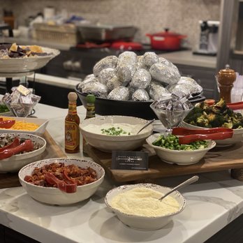 Nicolau Farms 2 Forks - Baked Potato Bar, with a variety of different toppings, sauces, and meats. - Food Delivery Services Near Me - Ceres, California Nicolau Farms 2 Forks - Baked Potato Bar, with a variety of different toppings, sauces, and meats. - Food Delivery Services Near Me - Ceres, California