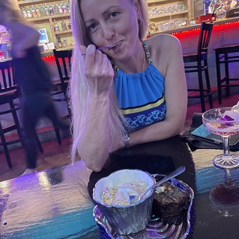 Deluxe Fun Dining - The birthday girl, the lovely Nina, enjoying ice cream - Bars Near Me - Charlotte, North Carolina