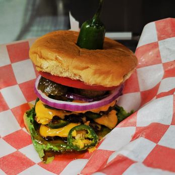 Lovies - Our premium triple smash burger! Three juicy, seared-to-perfection smash patties stacked high. - Southern Near Me - Grove City, Ohio Lovies - Our premium triple smash burger! Three juicy, seared-to-perfection smash patties stacked high. - Southern Near Me - Grove City, Ohio