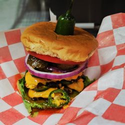 Lovies - Our premium triple smash burger! Three juicy, seared-to-perfection smash patties stacked high.