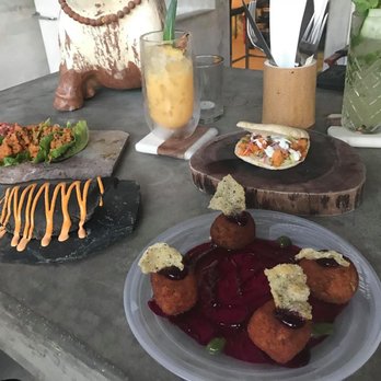 Luuma - Left to Right~ ~Vegan Taco ~Octopus Black Empanada ~Luuma Colada ~Chaya Croquettes ~Shrimp Kebob ~Magdalena - Cocktail Bars Near Me - Holbox, ROO Luuma - Left to Right~ ~Vegan Taco ~Octopus Black Empanada ~Luuma Colada ~Chaya Croquettes ~Shrimp Kebob ~Magdalena - Cocktail Bars Near Me - Holbox, ROO