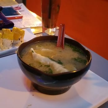 Sushi Mambo - Cilantro Dumpling Soup: Japanese style cilantro broth with dumplings - Sushi Bars Near Me - New York, New York Sushi Mambo - Cilantro Dumpling Soup: Japanese style cilantro broth with dumplings - Sushi Bars Near Me - New York, New York
