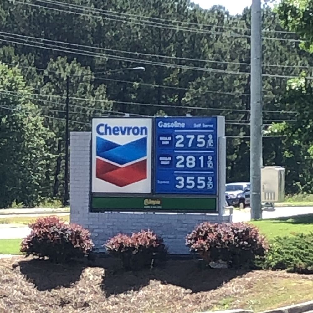 Chevron - a gas station sign in front of a gas station - Convenience Stores Near Me - Loganville, Georgia